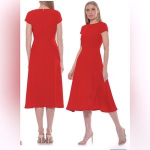 With Tags ALEXIA ADMOR Lily Crew Neck Midi Dress
Burgundy color size 8